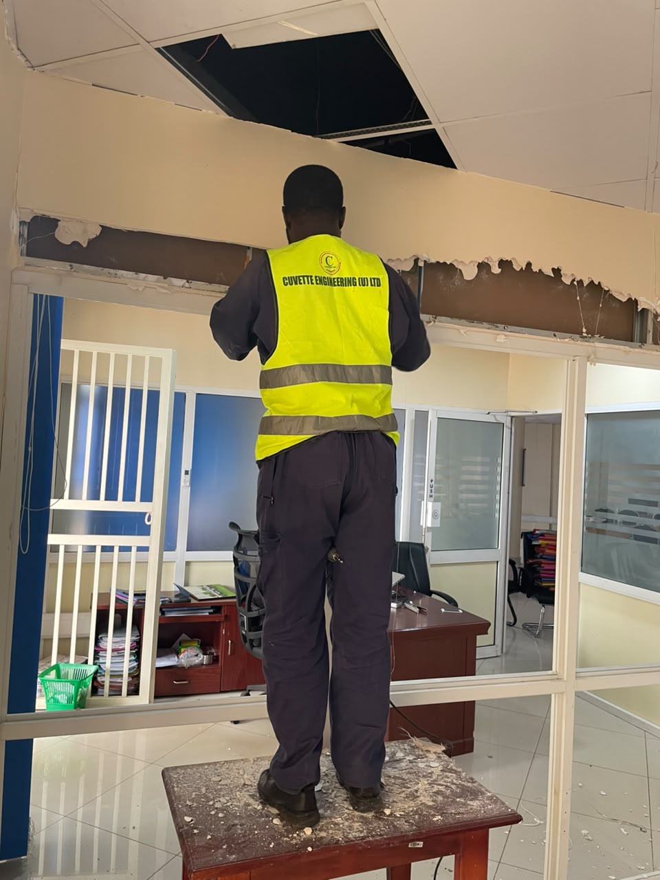 Ceiling renovation works by Cuvette Engineering technician